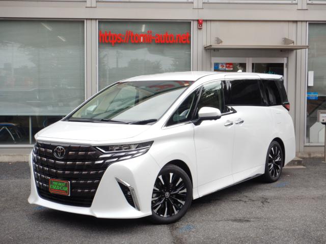 現行型6年式　アルファードハイブリッド25エグゼクティブラウンジ４WD　14インチディスプレイナビTV　ＪＢＬプレミアムサウンドシステム　14インチリヤシートエンターテインメントシステム　パノラミックビューモニター　本革エグゼクティブラウンジパワーシート　左右独立ムーンルーフ　ユニバーサルステップ　トヨタチームメイト　カラーヘッドアップディスプレイ　3眼LEDヘッドライト　シーケンシャルターンランプデジタルインナーミラー　ブラインドスポットモニター　両側パワースライドドア　パワーバックドア　CD&DVDデッキ　ITS connect　ナビ連動ビルトインETC(2,0)