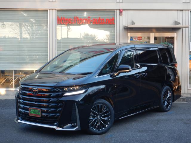 現行型6年式　ヴェルファイアハイブリッド25Zプレミア　14インチディスプレイナビTV　パノラミックビューモニター　13.2型有機EL後席ディスプレイ　本革エグゼクティブパワーシート　左右独立ムーンルーフ　トヨタチームメイト　カラーヘッドアップディスプレイ　ブラインドスポットモニター　ユニバーサルステップ　3眼LEDヘッドライト　シーケンシャルターンランプ　両側パワースライドドア　パワーバックドア　ナビ連動ビルトインETC(2,0)　社外ドライブレコーダー（前・後）