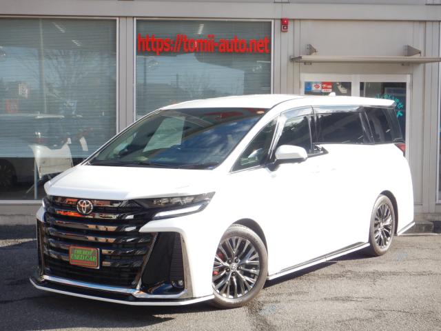 現行型６年式　ヴェルファイアハイブリッド25Zプレミア　14インチワイドディスプレイ　パノラミックビューモニター　13.2型有機EL後席ディスプレイ　本革エグゼクティブパワーシート　左右独立ムーンルーフ　社外エアロバージョン　トヨタチームメイト　カラーヘッドアップディスプレイ　ユニバーサルステップ　3眼LEDヘッドライト　シーケンシャルターンランプ　デジタルインナーミラー　ブラインドスポットモニター　両側パワースライドドア　パワーバックドア　ナビ連動ビルトインETC(2,0)　プレミアムサウンド&ツィーターシステム