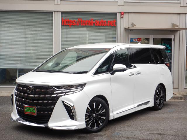 現行型5年式　アルファードハイブリッド25エグゼクティブラウンジ　14インチディスプレイナビTV　ＪＢＬプレミアムサウンドシステム　14インチリヤシートエンターテインメントシステム　パノラミックビューモニター　本革エグゼクティブラウンジパワーシート　左右独立ムーンルーフ　モデリスタエアロバージョン　トヨタチームメイト　カラーヘッドアップディスプレイ　3眼LEDヘッドライト　シーケンシャルターンランプ　デジタルインナーミラー　ブラインドスポットモニター　シグネチャーイルミブレード　両側パワースライドドア　パワーバックドア　ナビ連動ビルトインETC(2,0)　寒冷地仕様　ITS connect　CD&DVDデッキ